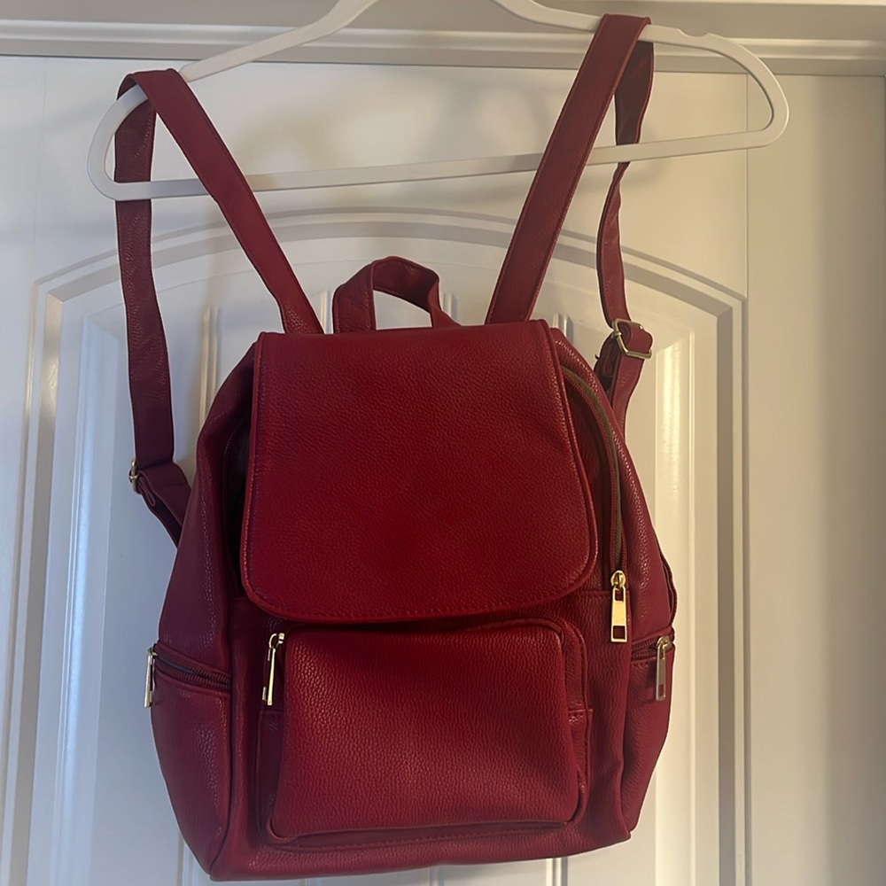 EUC Xin Xin Red Backpack purse (faux leather)